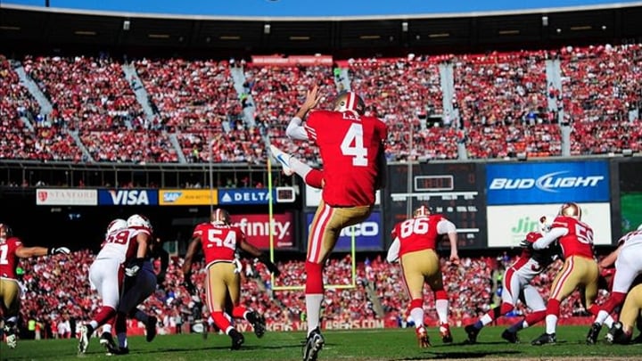 December 30, 2012; San Francisco, CA, USA; San Francisco 49ers punter Andy Lee (4) punts the ball during the first quarter against the Arizona Cardinals at Candlestick Park. The 49ers defeated the Cardinals 27-13. Mandatory Credit: Kyle Terada-USA TODAY Sports