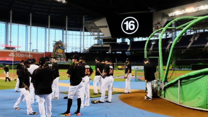 Sep 26, 2016; Miami, FL, USA; Miami Marlins teammates gather on the field before the game between the Miami Marlins and the New York Mets at Marlins Park. Mandatory Credit: Jasen Vinlove-USA TODAY Sports