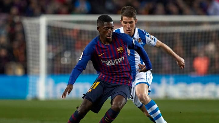 BARCELONA, SPAIN - APRIL 20: Ousmane Dembele of FC Barcelona competes for the ball with Aritz Elustondo of Real Sociedad during the La Liga match between FC Barcelona and Real Sociedad at Camp Nou on April 20, 2019 in Barcelona, Spain. (Photo by Quality Sport Images/Getty Images)