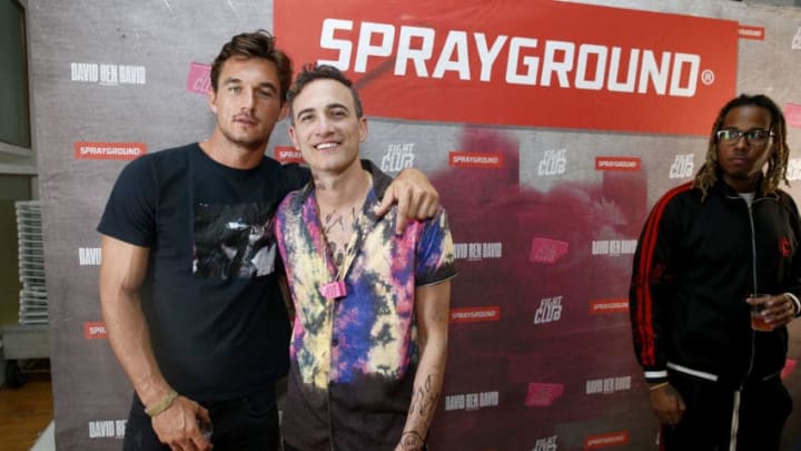 NEW YORK, NEW YORK - SEPTEMBER 10: Tyler Cameron and designer David Ben David pose backstage after the first ever runway show for Sprayground during New York Fashion Week hosted by David Ben David on September 10, 2019 in New York City. (Photo by Brian Ach/Getty Images for Sprayground)
