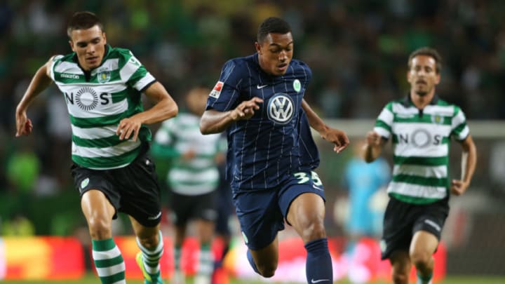 LISBON, PORTUGAL - JULY 30: Wolfsburg's defender Anton-Leander Donkor (C) with Sporting CP's midfielder Joao Palhinha (L) in action during the Pre Season Friendly match between Sporting CP and Wolfsburg at Estadio Jose Alvalade on July 30, 2016 in Lisbon, Portugal. (Photo by Gualter Fatia/Getty Images)