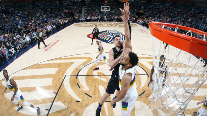 NEW ORLEANS, LA - FEBRUARY 12: Nikola Vucevic #9 of the Orlando Magic shoots the ball against the New Orleans Pelicans on February 12, 2019 at the Smoothie King Center in New Orleans, Louisiana. NOTE TO USER: User expressly acknowledges and agrees that, by downloading and or using this Photograph, user is consenting to the terms and conditions of the Getty Images License Agreement. Mandatory Copyright Notice: Copyright 2019 NBAE (Photo by Layne Murdoch Jr./NBAE via Getty Images)