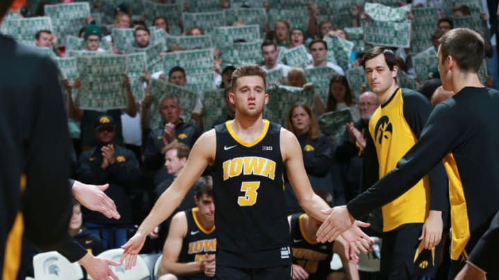 EAST LANSING, MI - DECEMBER 03: Jordan Bohannon #3 of the Iowa Hawkeyes during pregame introductions before the game against the Michigan State Spartans at Breslin Center on December 3, 2018 in East Lansing, Michigan. (Photo by Rey Del Rio/Getty Images)