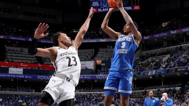 Memphis Tigers forward Landers Nolley II shoots over Cincinnati Bearcats guard Mike Adams-Woods at FedExForum. Getty Images.