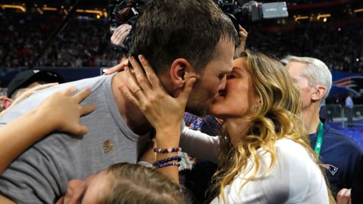 ATLANTA, GA - FEBRUARY 03: Tom Brady #12 of the New England Patriots kisses his wife Gisele Bündchen after the Super Bowl LIII against the Los Angeles Rams at Mercedes-Benz Stadium on February 3, 2019 in Atlanta, Georgia. The New England Patriots defeat the Los Angeles Rams 13-3. (Photo by Kevin C. Cox/Getty Images)