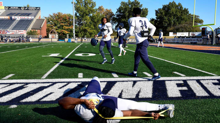 UT Martin football players run onto the field and stretch before practice on Wednesday, October 19, 2022, at Hardy M. Graham Stadium in Martin, Tenn.