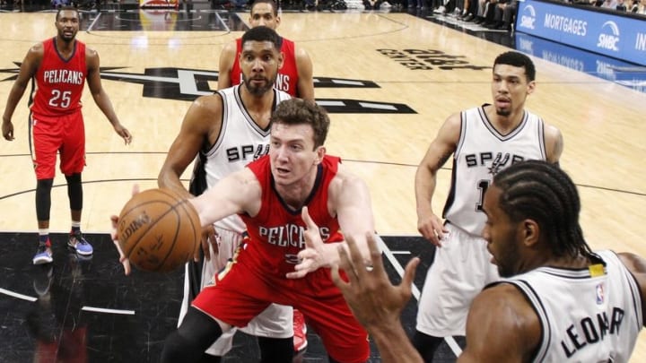 Mar 30, 2016; San Antonio, TX, USA; New Orleans Pelicans center Omer Asik (3) reaches for a rebound against the San Antonio Spurs during the first half at AT&T Center. Mandatory Credit: Soobum Im-USA TODAY Sports