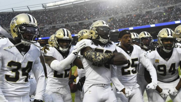 CHICAGO, ILLINOIS - OCTOBER 20: The New Orleans Saints celebrate a fumble recovery against the Chicago Bears during the second half at Soldier Field on October 20, 2019 in Chicago, Illinois. (Photo by David Banks/Getty Images)