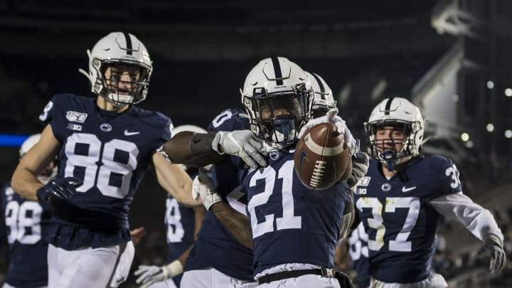 STATE COLLEGE, PA – NOVEMBER 30: Tyler Rudolph #21 of the Penn State Nittany Lions celebrates with teammates after recovering a kick against the Rutgers Scarlet Knights during the second half of the game at Beaver Stadium on November 30, 2019 in State College, Pennsylvania. (Photo by Scott Taetsch/Getty Images)