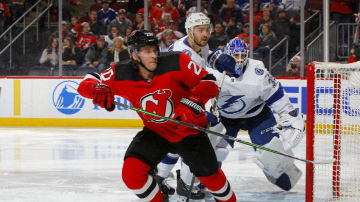 NEWARK, NEW JERSEY - JANUARY 12: Blake Coleman #20 of the New Jersey Devils in action against the Tampa Bay Lightning at Prudential Center on January 12, 2020 in Newark, New Jersey. The Devils defeated the Lightning 3-1. (Photo by Jim McIsaac/Getty Images)