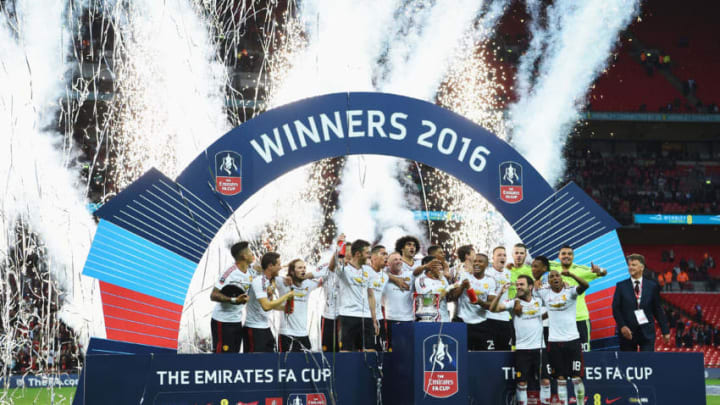 LONDON, ENGLAND - MAY 21: Manchester United players celebrate with the trophy after The Emirates FA Cup Final match between Manchester United and Crystal Palace at Wembley Stadium on May 21, 2016 in London, England. (Photo by Laurence Griffiths - The FA/The FA via Getty Images)