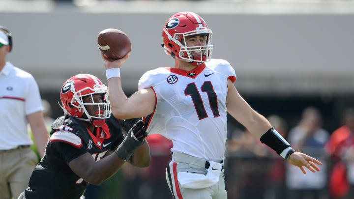 Apr 22, 2017; Athens, GA, USA; Georgia Bulldogs red team quarterback Jake Fromm (11) is sacked by black team linebacker D’Andre Walker (15) during the second half during the Georgia Spring Game at Sanford Stadium. Red defeated Black 25-22. Mandatory Credit: Dale Zanine-USA TODAY Sports
