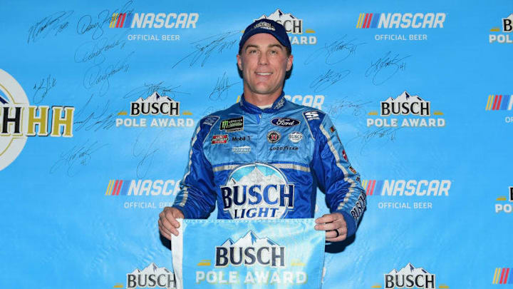 PHOENIX, AZ - NOVEMBER 09: Kevin Harvick, driver of the #4 Busch Light Ford, poses with the Busch Pole Award after posting the fastest lap during qualifying for the Monster Energy NASCAR Cup Series Can-Am 500 at ISM Raceway on November 9, 2018 in Phoenix, Arizona. (Photo by Jared C. Tilton/Getty Images)