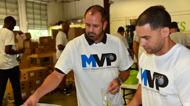 ORLANDO, FL - SEPTEMBER 6: Frank Vogel of the Orlando Magic helps with Hurricane Harvey Relief on September 6, 2017 at Clean the World in Orlando, Florida. NOTE TO USER: User expressly acknowledges and agrees that, by downloading and or using this photograph, User is consenting to the terms and conditions of the Getty Images License Agreement. Mandatory Copyright Notice: Copyright 2017 NBAE (Photo by Fernando Medina/NBAE via Getty Images)