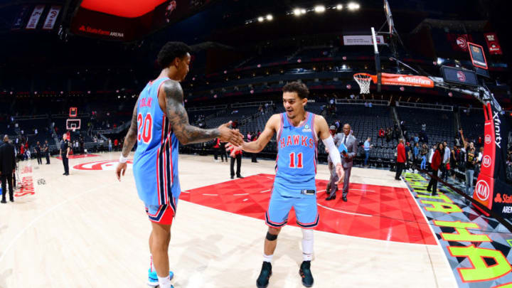 John Collins #20 of the Atlanta Hawks and Trae Young #11 of the Atlanta Hawks (Photo by Scott Cunningham/NBAE via Getty Images)