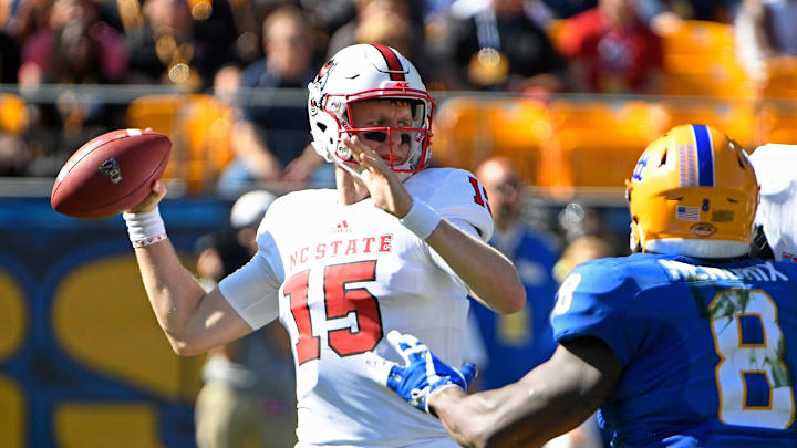 PITTSBURGH, PA – OCTOBER 14: Ryan Finley #15 of the North Carolina State Wolfpack drops back to pass in the first half during the game against the Pittsburgh Panthers at Heinz Field on October 14, 2017 in Pittsburgh, Pennsylvania. (Photo by Justin Berl/Getty Images)