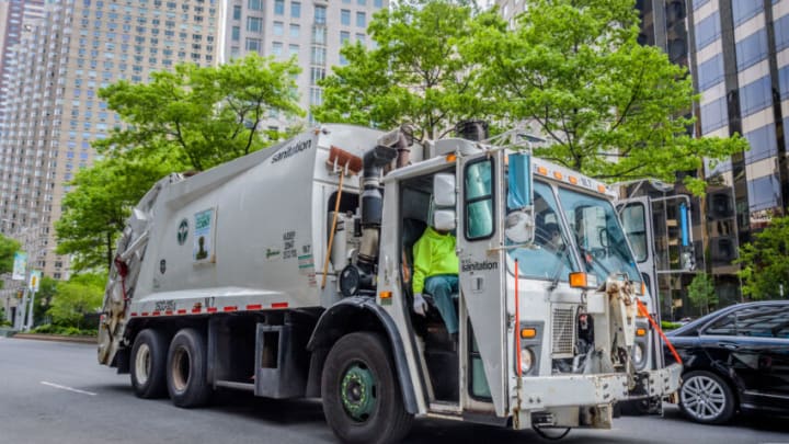 MANHATTAN, NEW YORK, UNITED STATES - 2020/05/24: A garbage truck driving around the almost empty streets of Manhattan. (Photo by Erik McGregor/LightRocket via Getty Images)