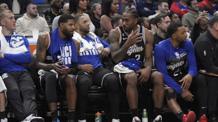 LOS ANGELES, CA - FEBRUARY 14: (L-R) Mason Plumlee #44, Paul George #13, Eric Gordon #10, Kawhi Leonard #2 and Norman Powell #24 of the Los Angeles Clippers interact on the bench. (Photo by Kevork Djansezian/Getty Images)