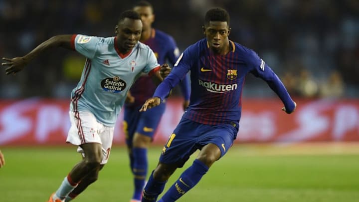 VIGO, SPAIN - APRIL 17: Pione Sisto of Celta de Vigo competes fo the ball with Ousmane Dembele of Barcelona during the La Liga match between Celta de Vigo and Barcelona at Municipal Balaidos on April 17, 2018 in Vigo, Spain. (Photo by Octavio Passos/Getty Images)