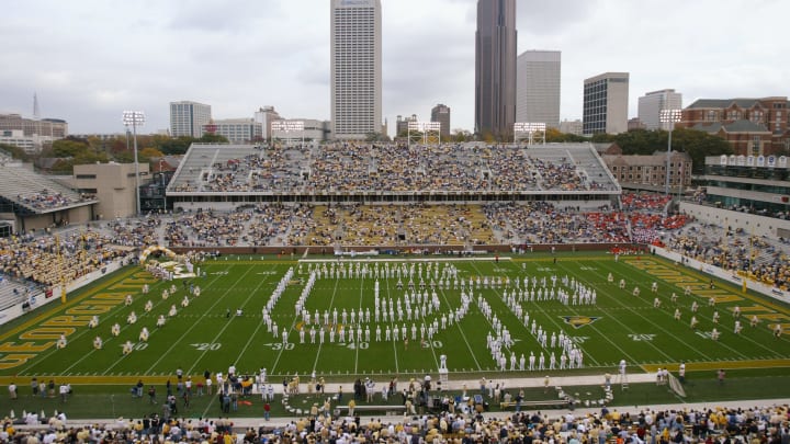 ATLANTA – NOVEMBER 20: The Georgia Tech Yellow Jackets Marching Band spells ‘GT’ during an intermission in the game against the University of Virginia Cavaliers at Bobby Dodd Stadium on November 20, 2004 in Atlanta, Georgia. The Cavaliers defeated the Yellow Jackets 30-10. (Photo by Doug Pensinger/Getty Images)