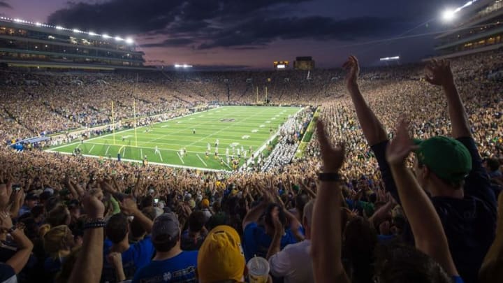 Sep 17, 2016; South Bend, IN, USA; Fans celebrate after a Notre Dame Fighting Irish touchdown in the first quarter against the Michigan State Spartans at Notre Dame Stadium. Mandatory Credit: Matt Cashore-USA TODAY Sports