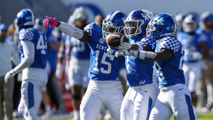 Oct 31, 2020; Lexington, Kentucky, USA; Kentucky Wildcats linebacker Jordan Wright (15) celebrates with defensive back Kelvin Joseph (1) and defensive back Tyrell Ajian (23) after an interception against the Georgia Bulldogs in the second half at Kroger Field. Mandatory Credit: Katie Stratman-USA TODAY Sports