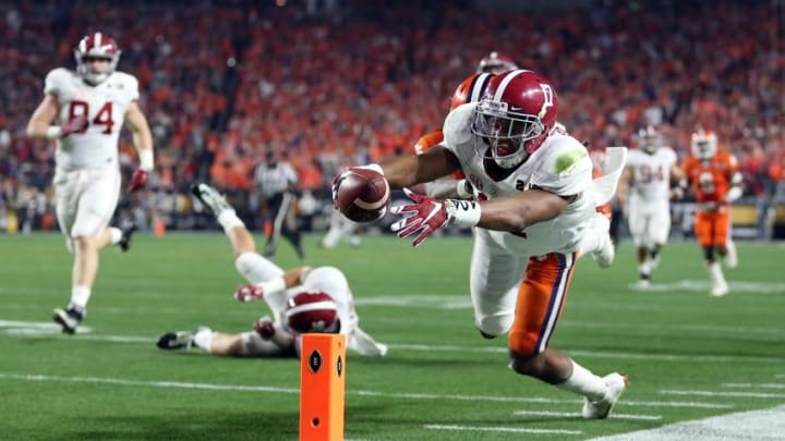 Jan 11, 2016; Glendale, AZ, USA; Alabama Crimson Tide running back Kenyan Drake (17) gets past Clemson Tigers safety T.J. Green (15) to score a touchdown on a kick return during the fourth quarter in the 2016 CFP National Championship at University of Phoenix Stadium. Mandatory Credit: Mark J. Rebilas-USA TODAY Sports