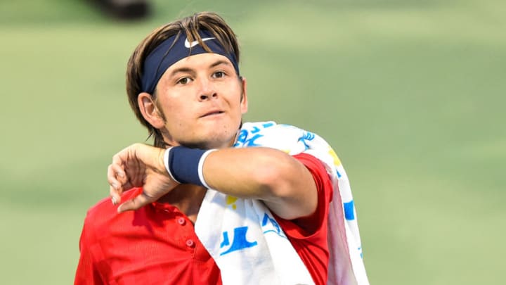 MONTREAL, QC - AUGUST 08: Jared Donaldson of the United States wipes himself down against Benoit Paire of France during day five of the Rogers Cup presented by National Bank at Uniprix Stadium on August 8, 2017 in Montreal, Quebec, Canada. (Photo by Minas Panagiotakis/Getty Images)