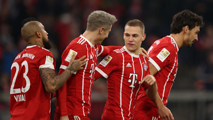 MUNICH, GERMANY - NOVEMBER 18: Robert Lewandowski of Bayern Muenchen (l) celebrates with Joshua Kimmich of Bayern Muenchen (2nd right) and his team after he scored his teams third goal to make it 3:0 during the Bundesliga match between FC Bayern Muenchen and FC Augsburg at Allianz Arena on November 18, 2017 in Munich, Germany. (Photo by Adam Pretty/Bongarts/Getty Images)