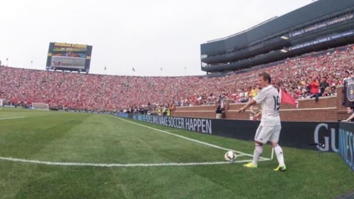 Aug 2, 2014; Ann Arbor, MI, USA; Real Madrid midfielder Luka Modric (19) does a corner kick during the game against the Manchester United at Michigan Stadium. Mandatory Credit: Tim Fuller-USA TODAY Sports