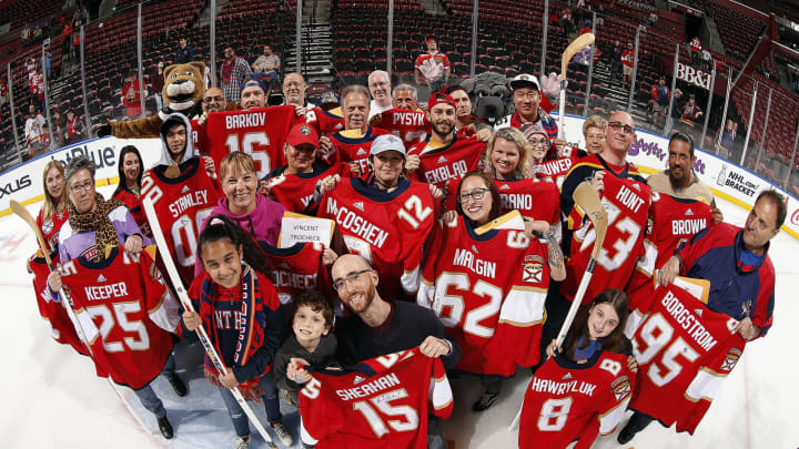 SUNRISE, FL – APRIL 4: Florida Panthers fans hold their players jerseys after their game against the New York Islanders at the BB&T Center on April 4, 2019 in Sunrise, Florida. (Photo by Eliot J. Schechter/NHLI via Getty Images)
