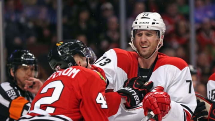 CHICAGO, IL – MARCH 02: Joakim Nordstrom #42 of the Chicago Blackhawks and Brett Bellemore #73 of the Carolina Hurricanes get into a shoving match at the United Center on March 2, 2015 in Chicago, Illinois. The Blackhawks defeated the Hurricanes 5-2. (Photo by Jonathan Daniel/Getty Images)