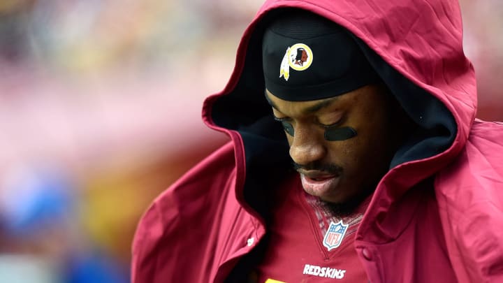 LANDOVER, MD – NOVEMBER 16: Quarterback Robert Griffin III #10 of the Washington Redskins of the Washington Redskins looks on in the second half of a game against the Tampa Bay Buccaneers at FedExField on November 16, 2014 in Landover, Maryland. (Photo by Patrick McDermott/Getty Images)