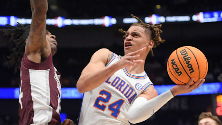 Mar 9, 2023; Nashville, TN, USA; Florida Gators guard Riley Kugel (24) shoots over Mississippi State Bulldogs forward Tyler Stevenson (14) during the second half at Bridgestone Arena. Mandatory Credit: Steve Roberts-USA TODAY Sports