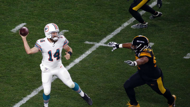 PITTSBURGH, PA – OCTOBER 28: Ryan Fitzpatrick #14 of the Miami Dolphins drops back to pass against Cameron Heyward #97 of the Pittsburgh Steelers on October 28, 2019 at Heinz Field in Pittsburgh, Pennsylvania. (Photo by Justin K. Aller/Getty Images)