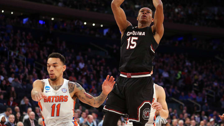 Mar 26, 2017; New York, NY, USA; South Carolina Gamecocks guard PJ Dozier (15) shoots the ball against Florida Gators guard Chris Chiozza (11) during the first half in the finals of the East Regional of the 2017 NCAA Tournament at Madison Square Garden. Mandatory Credit: Brad Penner-USA TODAY Sports