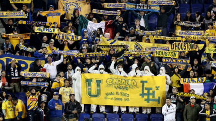 HARRISON, NEW JERSEY – MARCH 11: UANL Tigres fans cheer in the first half against the New York City FC during Leg 1 of the quarterfinals during the CONCACAF Champions League match at Red Bull Arena on March 11, 2020 in Harrison, New Jersey. (Photo by Elsa/Getty Images)