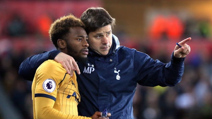SWANSEA, WALES - APRIL 05: (L-R) Georges-Kevin N'Koudou of Tottenham Hotspur is given instructions by manager Mauricio Pochettino during the Premier League match between Swansea City and Tottenham Hotspur at The Liberty Stadium on April 5, 2017 in Swansea, Wales. (Photo by Athena Pictures/Getty Images)
