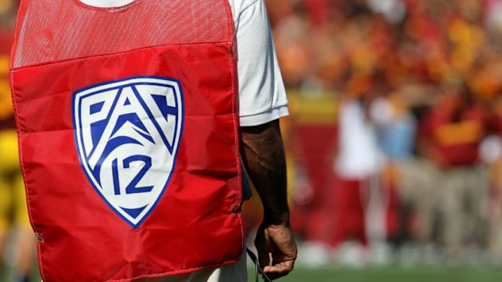 LOS ANGELES - SEPTEMBER 3: A sideline official wears a vest with the logo for the Pac 12 conference during the game between the Minnesota Golden Gophers and the USC Trojans at the Los Angeles Memorial Coliseum on September 3, 2011 in Los Angeles, California. USC won 19-17. (Photo by Stephen Dunn/Getty Images)
