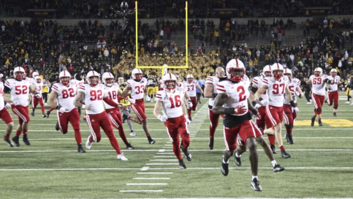 The Nebraska Cornhuskers rush the field (Photo by Matthew Holst/Getty Images)