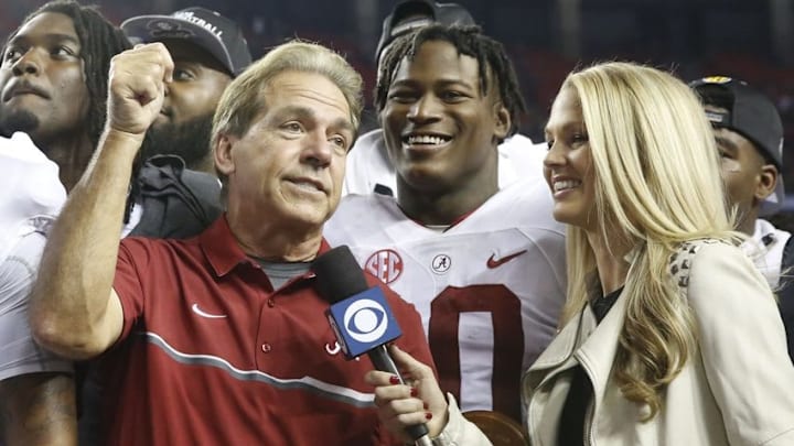 Dec 3, 2016; Atlanta, GA, USA; Alabama Crimson Tide head coach Nick Saban is interviewed by CBS reporter Allie LaForce after the SEC Championship college football game against the Florida Gators at Georgia Dome. Alabama defeated Florida 54-16. Mandatory Credit: Jason Getz-USA TODAY Sports