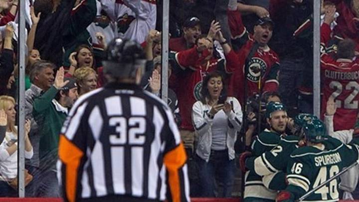 May 5, 2013; Saint Paul, MN, USA; Minnesota Wild forward Pierre-Marc Bouchard (96) celebrates his goal with teammates against Chicago Blackhawks during the first period in game three of the first round of the 2013 Stanley Cup playoffs at Xcel Energy Center. Mandatory Credit: Brace Hemmelgarn-USA TODAY Sports
