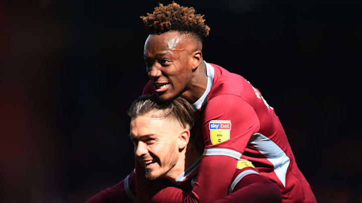 BIRMINGHAM, ENGLAND - MARCH 10: Jack Grealish and Tammy Abraham of Aston Villa celebrates at full-time during the Sky Bet Championship match between Birmingham City v Aston Villa at St Andrew's Trillion Trophy Stadium on March 10, 2019 in Birmingham, England. (Photo by Nathan Stirk/Getty Images)