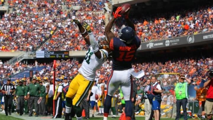 Sep 28, 2014; Chicago, IL, USA; Chicago Bears wide receiver Brandon Marshall (15) catches a pass over Green Bay Packers cornerback Davon House (31) during the second half at Soldier Field. The catch was ruled out of bounds. Green Bay won 38-17. Mandatory Credit: Dennis Wierzbicki-USA TODAY Sports Sep 28, 2014; Chicago, IL, USA; Chicago Bears wide receiver Brandon Marshall (15) catches a pass over Green Bay Packers cornerback Davon House (31) during the second half at Soldier Field. The catch was ruled out of bounds. Green Bay won 38-17. Mandatory Credit: Dennis Wierzbicki-USA TODAY Sports