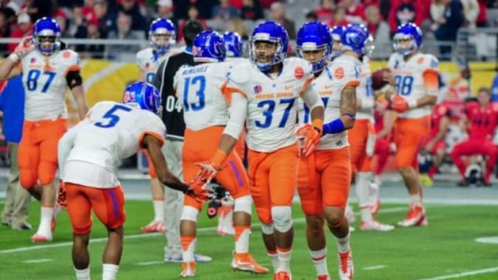 Dec 31, 2014; Glendale, AZ, USA; Boise State Broncos cornerback Cameron Hartsfield (37) warms up with teammates prior to the game against the Arizona Wildcats in the 2014 Fiesta Bowl at Phoenix Stadium. Mandatory Credit: Matt Kartozian-USA TODAY Sports