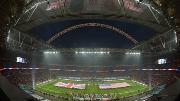 Oct 27, 2013; London, United Kingdom; A general view of the British flag and the United States flag on the field during the playing of the national anthem prior to the NFL International Series game between the San Francisco 49ers and the Jacksonville Jaguars at Wembley Stadium. Mandatory Credit: Kirby Lee-USA TODAY Sports