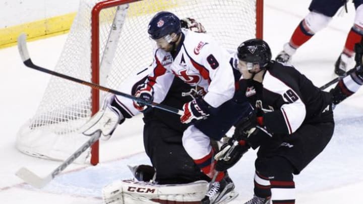 Giorgio Estephan #9 of the Lethbridge Hurricanes scores a goal against goaltender Payton Lee #1 of the Vancouver Giants near Jesse Roach #19 of the Giants during the first period of their WHL game at the Pacific Coliseum on October 28, 2015 in Vancouver, British Columbia, Canada. Oct. 27, 2015 - Source: Ben Nelms/Getty Images North America