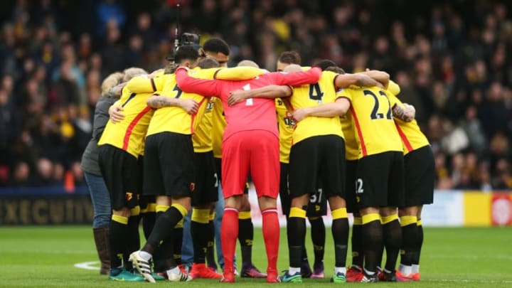 WATFORD, ENGLAND - NOVEMBER 27: The Watford team create a huddle prior to kick off during the Premier League match between Watford and Stoke City at Vicarage Road on November 27, 2016 in Watford, England. (Photo by Alex Morton/Getty Images)