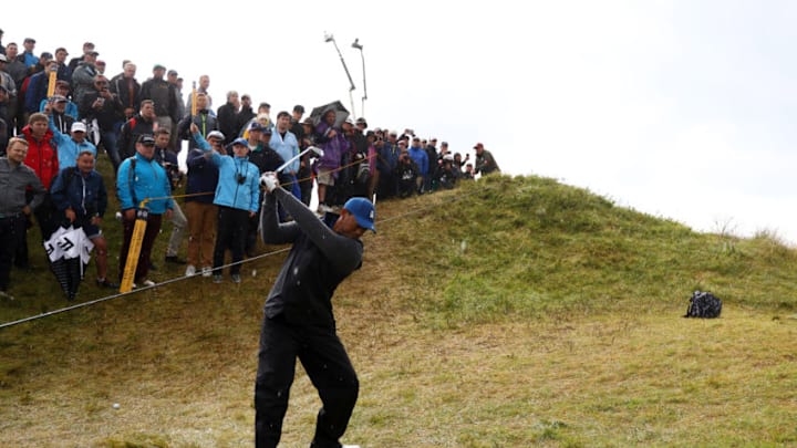 PORTRUSH, NORTHERN IRELAND - JULY 18: Tiger Woods of the United States plays a shot during the first round of the 148th Open Championship held on the Dunluce Links at Royal Portrush Golf Club on July 18, 2019 in Portrush, United Kingdom. (Photo by Francois Nel/Getty Images)
