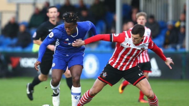 COBHAM, ENGLAND - NOVEMBER 21: Florin Gardos of Southampton tackles Michi Batshuayi of Chelsea during the Premier League 2 match between Chelsea and Southampton at Chelsea Training Ground on November 21, 2016 in Cobham, England. (Photo by Alex Pantling/Getty Images)